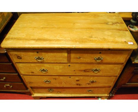 A Victorian pine round cornered chest, of two short over three long drawers, on bracket supports, w.94cm