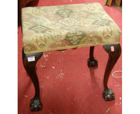 An early 20th century walnut framed and floral tapestry upholstered dressing stool, on cabriole supports, w.49cmCondition rep