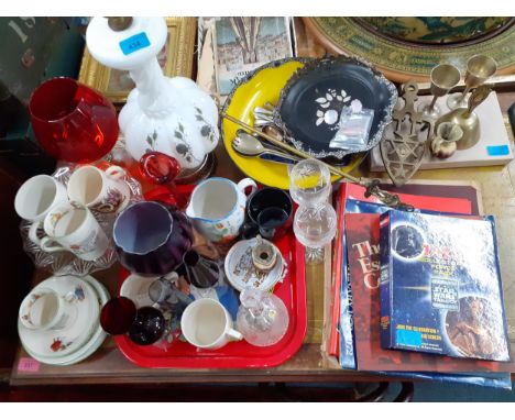 A late Victorian painted milk glass table lamp, collectables to include 1970's Esso World Cup coins, badges, Man in Flight an