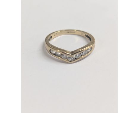 A 9ct gold chevron ring inset with seven glass stones, size K, together with a gold plated curb link braceletLocation: 