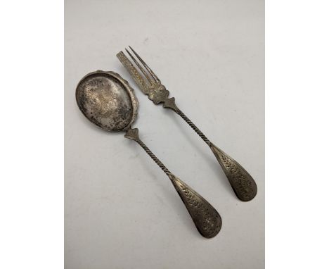 A silver fork and serving spoon, possibly Dutch, both with ornately decorated handles and rope twist stems, 50gLocation: 
