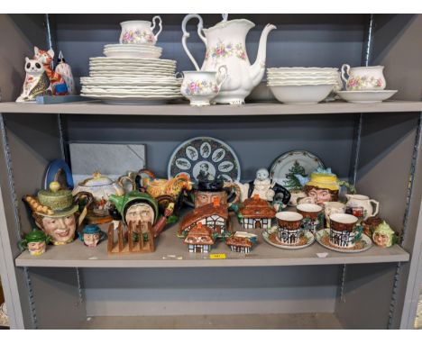 A mixed lot of ceramics to include a group of character jug /teapots to include Beswick, Lingard and Oliver Twist example, a 