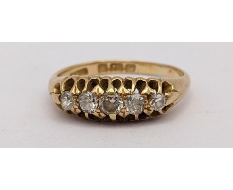 An 18ct gold five stone diamond ring, 3.2gLocation: 