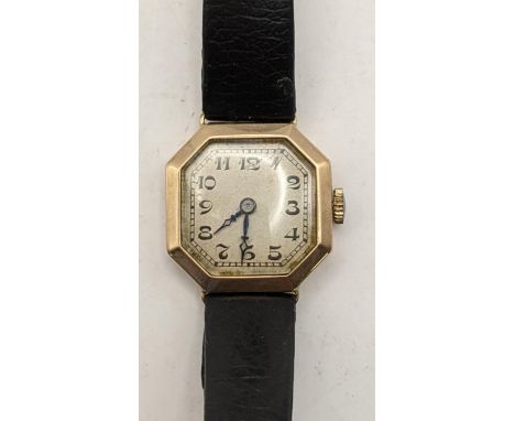 An early 20th century 9ct gold ladies manual wind wristwatch on a black leather strapLocation: 