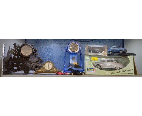 A mixed lot to include a Japanned mantel clock, an 8-day car clock in a Victorian case and model cars to include a boxed Reve