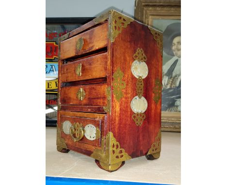 A miniature oriental 4 height chest/jewellery box, with brass and jade coloured mounts. 