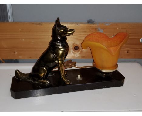 An Art Deco style light with rectangular marble base, spelter Alsation and an orange light shade, L28cm 