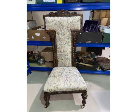 A Victorian highback stained walnut "Prie Dieu" with barley twist side columns, floral tapestry upholstery &amp; turned flute