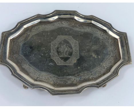 A Georgian small oval salver with chased decoration, on bun feet, London 1810, 4.3 oz --- THIS TRAY MATCHES THE TEAPOT AT LOT