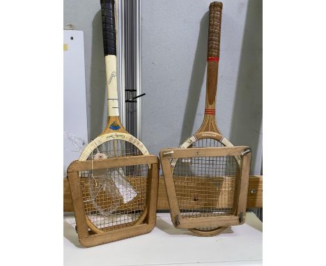 Two mid 20th century tennis rackets "Maxply" light medium 3 by Dunlop and "Whipshaft County Model Cleves" by Mitre, both with