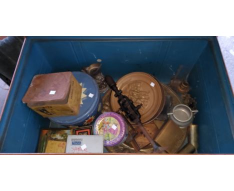 A tin trunk and contents:  old tins; metal wire and collectables 