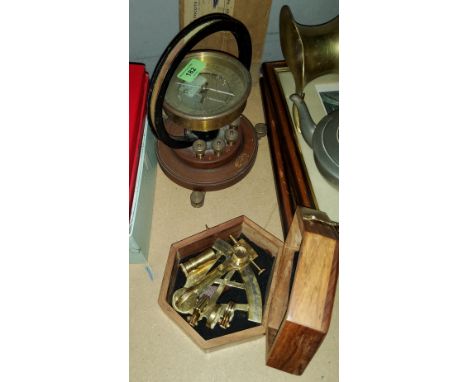 A small wooden cased sextant and a galvanometer 