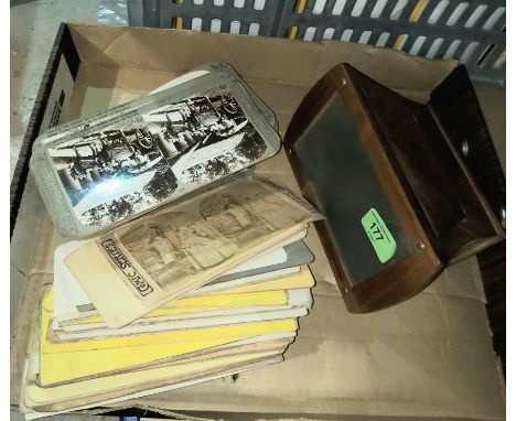 A pair of antique walnut cased stereocard viewers and aselection of cards 