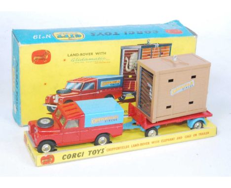 A Corgi Toys gift set 19 Chipperfields Land Rover with elephant and cage on trailer, comprising of red and blue Land Rover wi