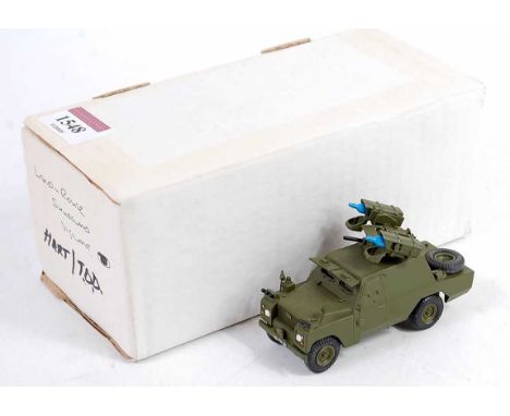 A Hart Models 1/48 scale white metal and resin model of a Shoreland Vigilant armoured Land Rover, appears factory finished an