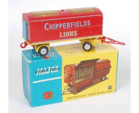 A Corgi Toys No. 1123 Chipperfields Circus animal cage truck comprising of red and blue body with yellow chassis and plastic 