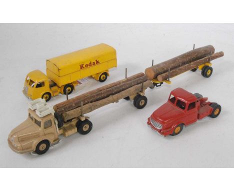 Three various loose Dinky Toy commercial vehicles to include a Panhard Kodak tractor unit and covered trailer, a No. 39 Dinky