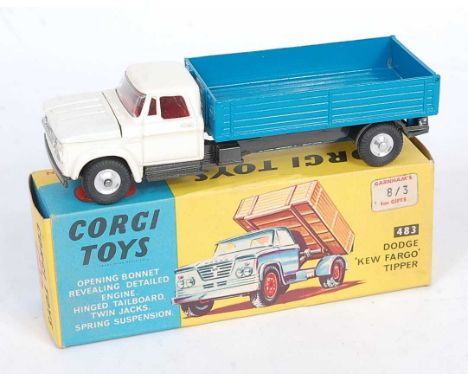 A Corgi Toys No. 483 Dodge Kew Fargo tipper, comprising white cab, blue back and graphite grey chassis, housed in the origina