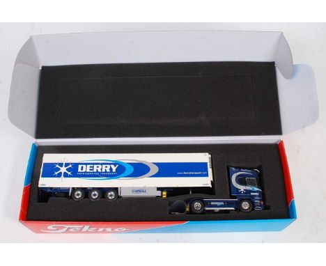 A Tekno 1/50 scale model of a Derry Transport Scania R500 tractor unit with refrigerated trailer, housed in the original foam