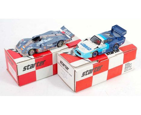 A Starter Kits Porsche 1/43 scale resin factory/hand built race car group to include a Porsche 1994 K7 race car, together wit