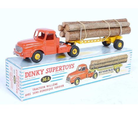 A French Dinky Toys No. 36A Willemi tractor unit and trailer comprising of orange cab and chassis with yellow hubs and matchi