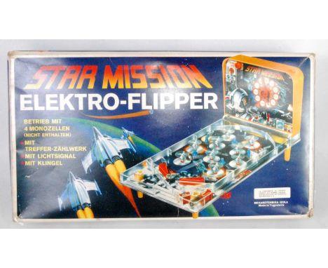 A 1980s original Star Mission Flipper battery operated pinball set, made in Yugoslavia, and housed in the original pictorial 