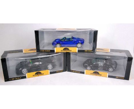 A Chrono 1/18 scale boxed Lotus racing car diecast group, three examples to include a No. H1022 Lotus Elise 1997 black saloon