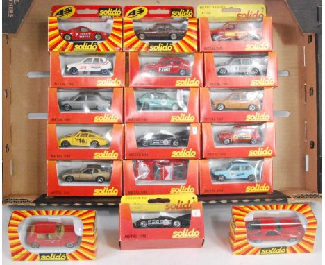 18 various window boxed Solido 1/43 scale racing and saloons to include a Peugeot 504, a Peugeot ZS, a BMW 530, and others