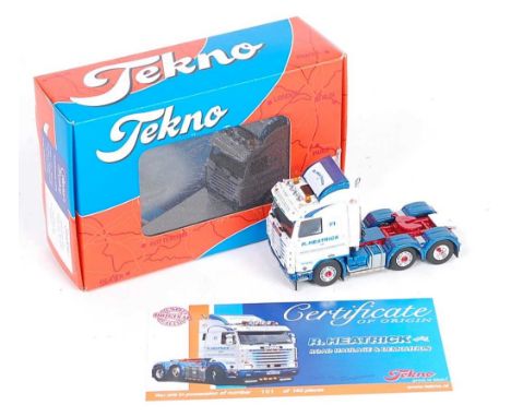 A Tekno 1/50 scale boxed model of a Scania 500 V8 series R Heatrick Road Haulage &amp; Demolition tractor unit, with wing mir
