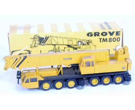 An NZG Model No. 136 1/50 scale model of a Grove TM800 heavy duty crane, finished in yellow and black with Grove livery and h