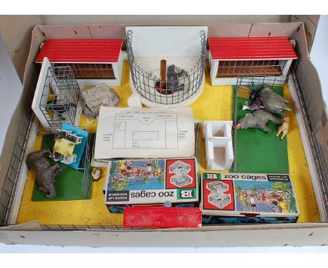 An Elf Toys No. 16 boxed zoo playset of wooden and metal construction with various interchangeable animal pens and accessorie