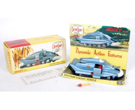 A Dinky Toys No. 104 Captain Scarlet Spectrum Pursuit Vehicle comprising of metallic blue body with rocket firing mechanism, 