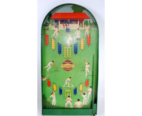 A Vintage early 20th century Amersham Pin Cricket Bagatelle comprising of wooden structure with various metal balls, complete