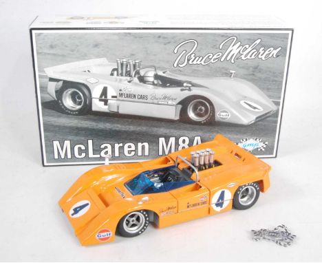 A GMP model No. 12021 1/18 scale model of a Maclaren M88 Bruce Maclaren race car, housed in the original polystyrene packed b