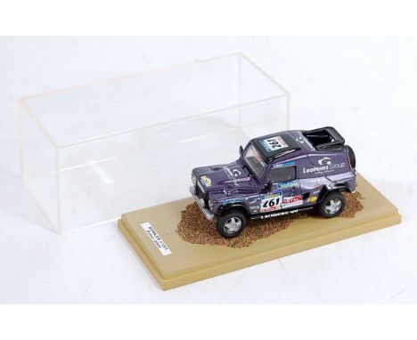 An MEA 1/43 scale white metal and resin factory built model of a Bowler No. 261 Dakar 2004 racing Jeep finished in metallic p