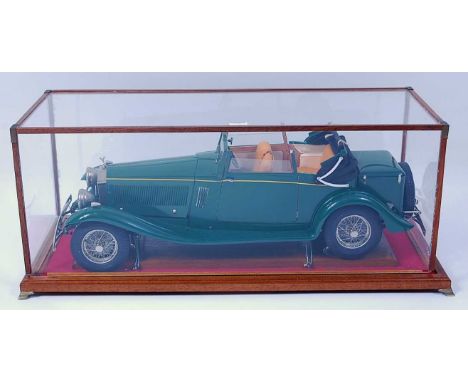 A Pocher 1/8 scale kit built model of a 1933 Rolls Royce Phantom Ambassador finished in green with orange interior and yellow