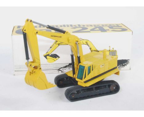 An NZG No. 160 1/50 scale model of a Caterpillar 245 tracked excavator housed in the original Caterpillar branded all-card bo