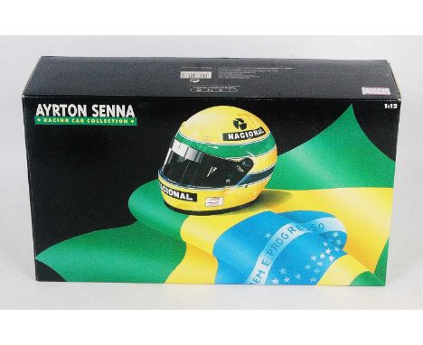 A Minichamps Model No. 881212 Ayrton Senna Maclaren MP 4/4 Formula One race car, appears as issued, and housed in the origina