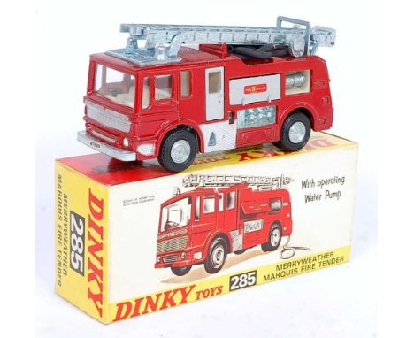 A Dinky Toys No. 285 Merryweather Marquis fire tender, comprising of metallic red body with silver detailing and silver ladde