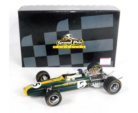 An Exoto Grand Prix Classics 1/18 scale model of a Lotus Ford type 49 Grand Prix race car,  finished in green and yellow with