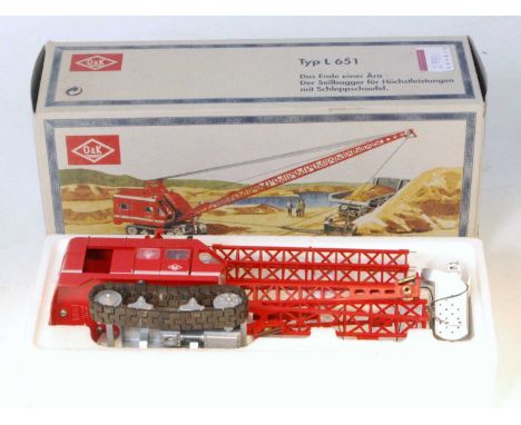 An NZG No. 4401 1/50 scale model of an O&amp;K type L651 tracked drag line crane, finished in O&amp;K red, housed in the orig