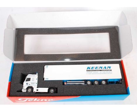 A Tekno 1/50 scale boxed Keenan International Transport Volvo Globetrotter XL460 tractor unit with refrigerator trailer, hous