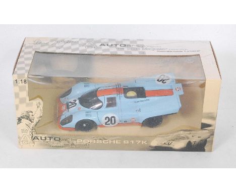 An Autoart The Steve McQueen Collection Model No. 80030 1/18 scale model of a Steve McQueen Porsche 917K race car, finished i