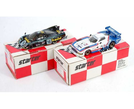 A Starter Kits 1/43 scale resin high speed racing model group to include an IMSA 1984 Ford GTP 7/11 race car, together with a