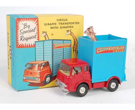 A Corgi Toys No. 503 Chipperfields Circus giraffe transporter with giraffes, comprising of red cab and chassis with blue back