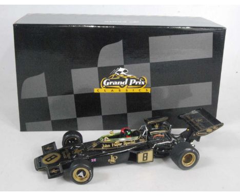 An Exoto Grand Prix Classics 1/18 scale model of a Lotus Ford type 72D John Player Special Formula 1 race car, finished in bl