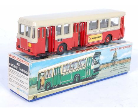 A French Dinky Toys No. 889 Parisian Auto Bus comprising of red and cream body with red hubs, housed in the original blue &am