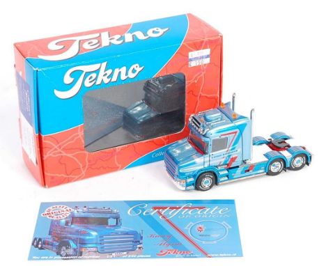 A Tekno 1/50 scale Longthorn Transport model of a Scania T Series 580 V8 tractor unit finished in two-tone metallic blue with