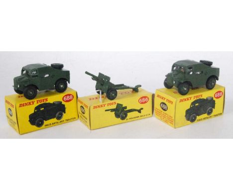 Three various boxed Dinky Toy military diecasts to include 2x No. 688 field artillery tractor, and a No. 686 25 pounder field