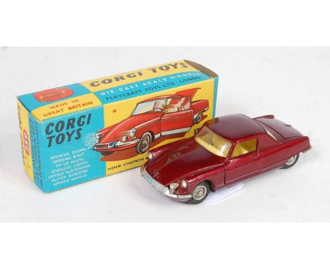 A Corgi Toys No. 259 Le Dandy Coupe, comprising of maroon body with yellow interior and wirework hubs, housed in the original